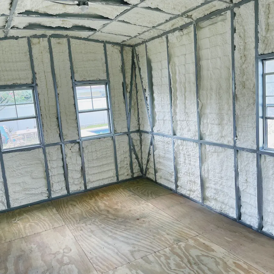 Closed-cell spray foam insulation applied to wall cavities in a residential project in Indio